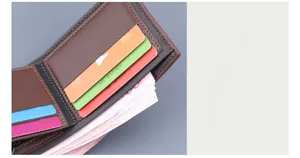 Detail of a brown leather bi-fold wallet for men with card slots and cash compartment