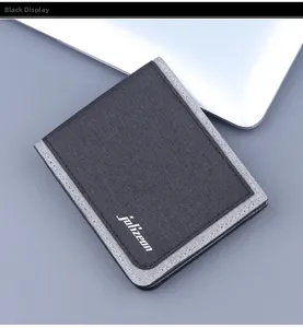 Close-up of minimalist two-tone canvas wallet showing texture and brand logo