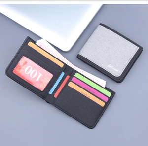 Canvas bifold wallet interior showing card slots and large cash compartment