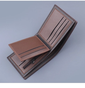 Detail of dark brown leather wallet with contrast stitching and multi-slot interior