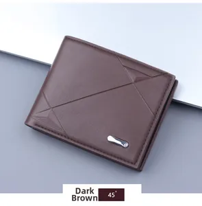 Close-up of brown litchi grain leather men's wallet with geometric lines and metal detail