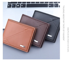 Close-up of men's bifold wallets with geometric embossed leather texture and logo details