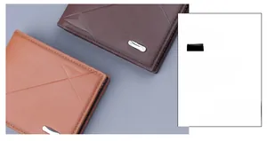 Close-up of geometric embossed leather wallet showing detailed stitching and metal logo