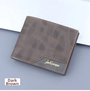 Detail of dark brown leather wallet with cross-hatch texture and precise stitching