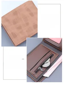 Detailed view of brown wallet cross-texture surface and smooth zipper coin pocket