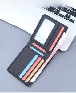 Detailed interior of slim canvas bifold wallet featuring multiple card slots and ID window