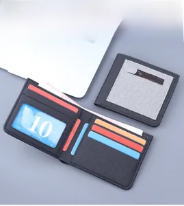 Detail view of a slim canvas wallet with multiple card slots and zipper pocket