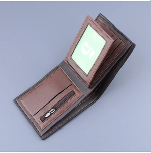 Detail view of the interior layout of the brown and black bi-fold leather wallet for men