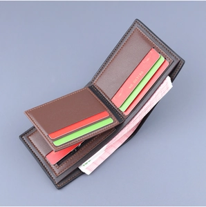 Close-up of the bi-fold wallet interior showing multiple card slots and large cash capacity