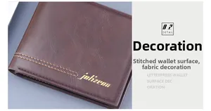 Detail of dark brown leather wallet showing the gold logo and fine double-line stitching