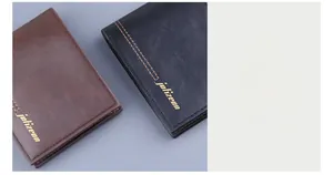 Detail view of leather wallet stitching with premium embossed texture in brown and black
