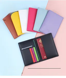 Detail view of colorful passport holder collection with organized interior card slots