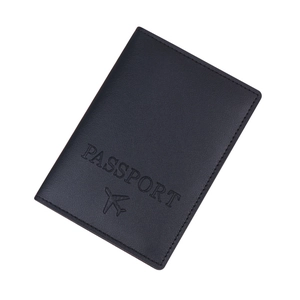 Navy blue leather passport holder with embossed airplane icon and passport text