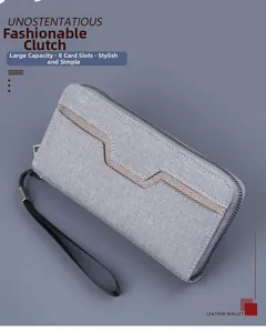 Detail of grey canvas wallet featuring 8 card slots, large capacity and secure wrist strap