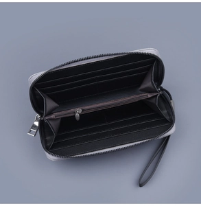 Internal layout of canvas long wallet featuring eight card slots and zip coin pocket