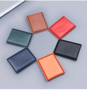 Detailed overhead view of premium leather driving license covers in six vibrant colors
