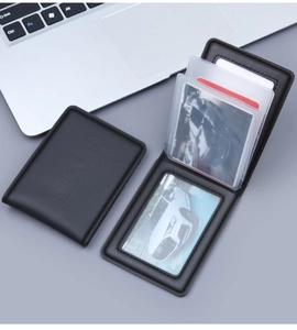Detail of premium black leather driver's license cover with embossed text and card slots