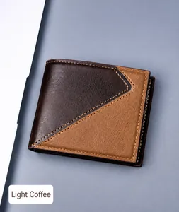 Detail view of men's tri-fold leather wallet in two-tone brown with fine stitching