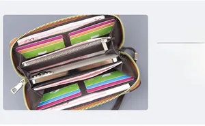 Internal structure of brown canvas wallet with multiple card slots and phone pocket