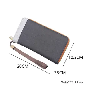 Men's large capacity canvas clutch wallet in grey tones with a brown wrist strap