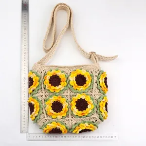 Handmade crochet sunflower crossbody bag with beige yarn and floral knitted design