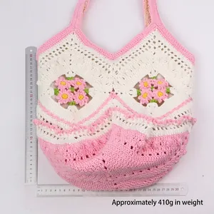 Handmade crochet tote bag with pink daisy flowers and green leaves weighing 410g