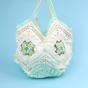 Handmade crochet daisy handbag in mint green and white knit for women's summer style