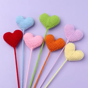 Handmade crochet heart flowers in vibrant colors for gifts and home decoration