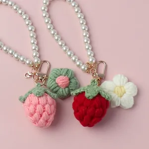 Handmade crochet strawberry and flower keychains with pearl strap and metal clasp
