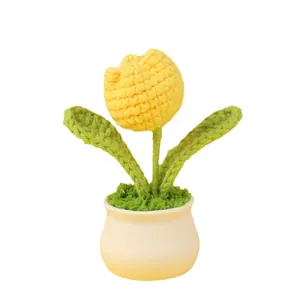 Handmade crochet yellow tulip flower in a white pot for home and office decor