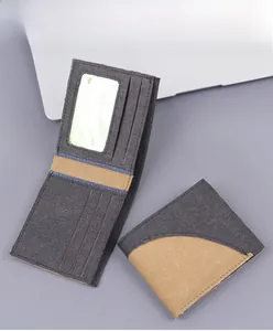 Detailed interior of denim bifold wallet showing nine card slots and an ID window
