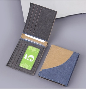Detail view of denim canvas wallet showing multiple card slots and internal bi-fold structure