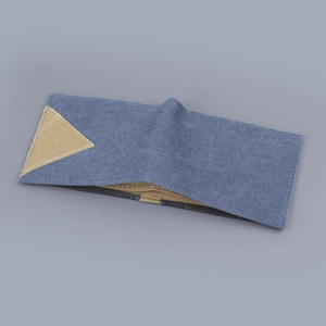 Short bifold denim canvas wallet for men featuring 9 card slots and a blue industrial style
