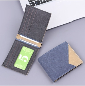Detail of bifold canvas wallet interior showing multiple card slots and clear ID window