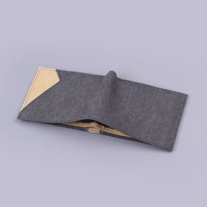 Slim bi-fold denim canvas wallet for men featuring 9 card slots in dark charcoal grey