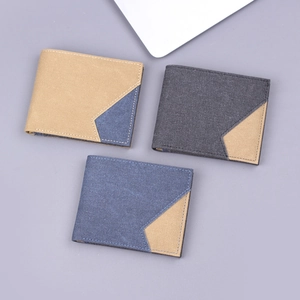 Three men's canvas bi-fold wallets featuring a geometric patchwork design in mixed colors