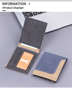 Detail of vintage canvas bifold wallet with multiple card slots and contrast stitching