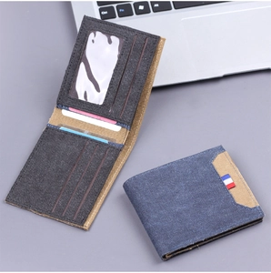 Detail of canvas bi-fold wallet showing interior card slots and blue-khaki color stitching