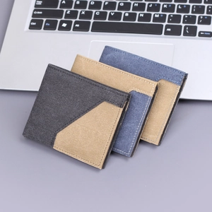 Three minimalist men's canvas wallets with vintage patchwork design in various colors