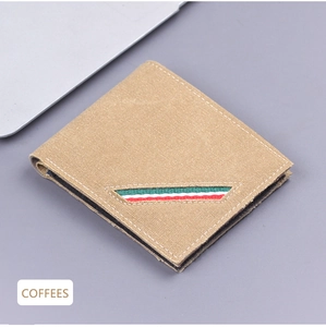 Détail de portefeuille en toile marron café avec des coutures blanches contrastées