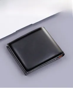 Detailed view of a sleek black leather men's bifold wallet with professional stitching