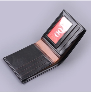 Detailed view of men's bifold leather wallet showing card slots and transparent ID window