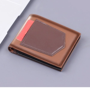 Detail view of men's bifold brown wallet featuring a contrasting card pocket and stitching