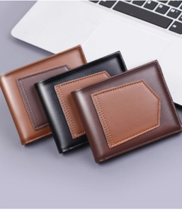Detailed view of assorted men's bifold wallets in brown and black leather finishes