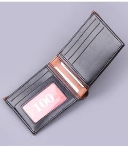 Detail view of bi-fold men's wallet with multi-card slots and a clear ID window