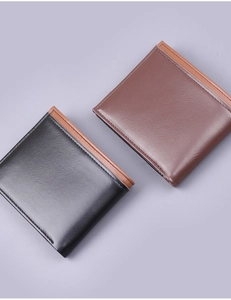 Detailed view of short bifold men's wallets in black and dark brown with contrast stitching