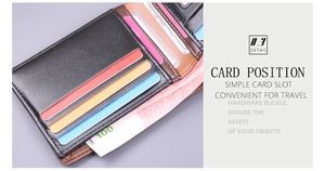 Detail view of bi-fold men's leather wallet with multiple colorful internal card slots