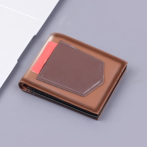 Men's bifold brown leather wallet featuring contrast card slot and modern slim design