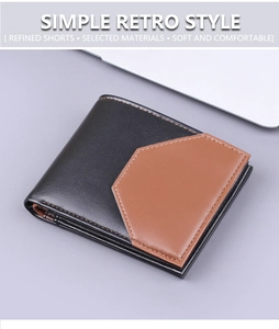 Close-up of minimalist bifold wallet with black and brown leather and neat stitching