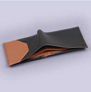 Close-up of a men's bifold wallet with contrast stitching and two-tone color design